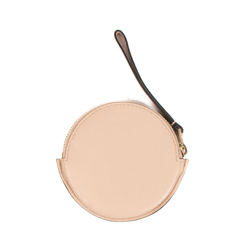 Shop an authentic preloved Delvaux Nude Calfskin Visite Masquée Round Apple Coin Purse on Labellov.com