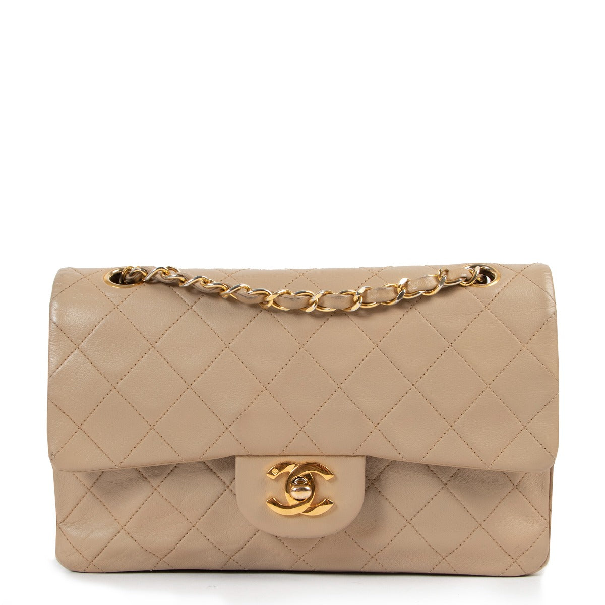 Shop authentic second hand designer luxury Chanel Vintage Beige Small Classic Flap Bag at Labellov