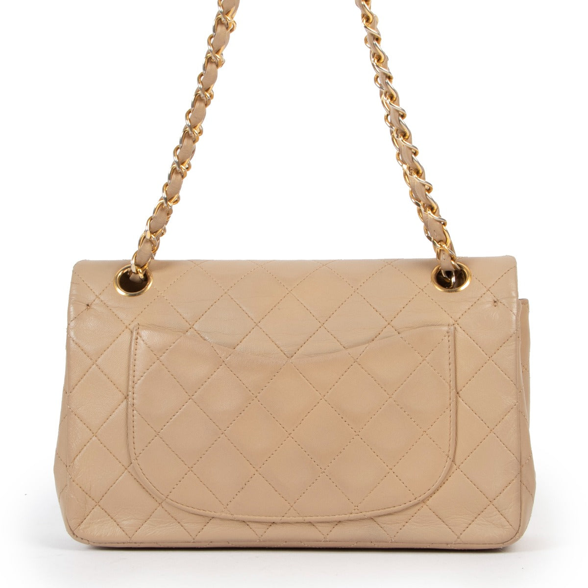 Shop authentic second hand designer luxury Chanel Vintage Beige Small Classic Flap Bag at Labellov