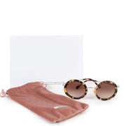 Buy an authentic second hand Miu Miu Round Tortoise Sunglasses in very good condition at Labellov.