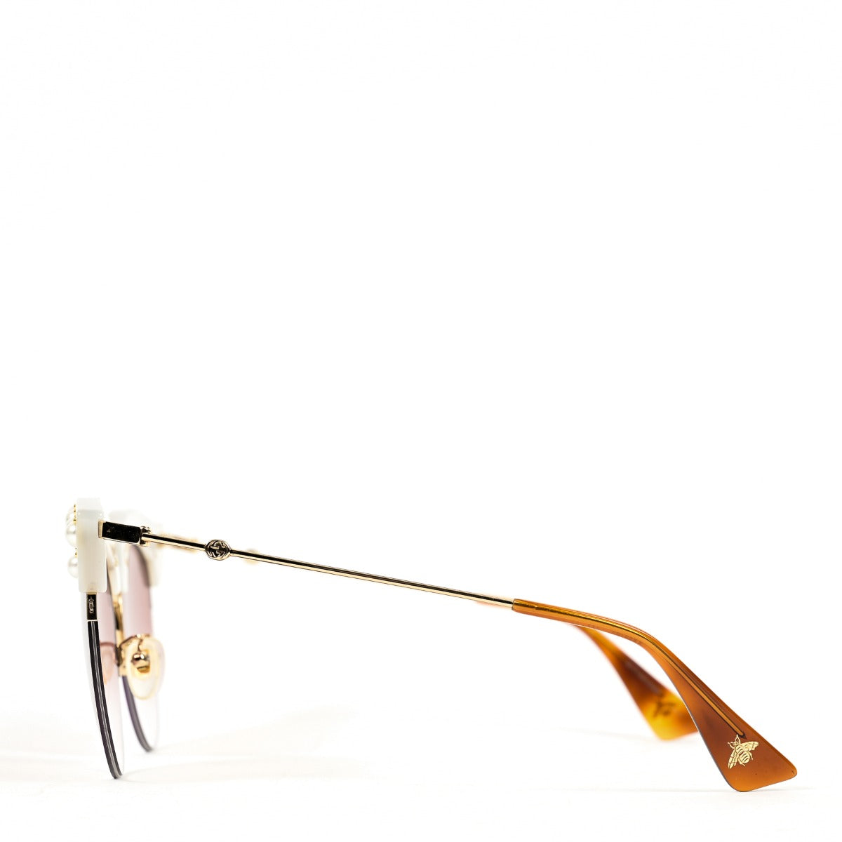 Buy verified second-hand Gucci Pink Acetate Cat-Eyed Pearl Studded Sunglasses in very good condition at Labellov Antwerp