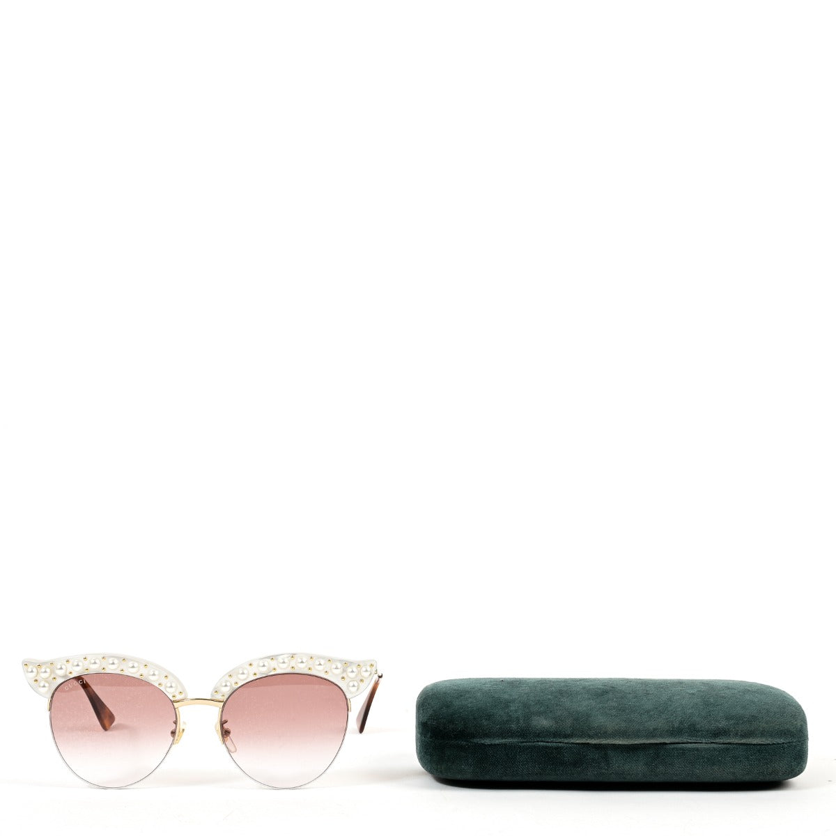 Lunettes de soleil œil-de-chat Gucci roses en acétate cloutées de perles