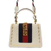Shop safe online at Labellov in Antwerp, Brussels and Knokke this 100% authentic second hand Gucci Off White Star Print Mini Sylvie Top Handle Bag