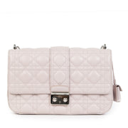Buy authentic secondhand Dior Miss Dior Pale Pink Cannage Quilted Lambskin Leather Medium Flap Bag at the right price at LabelLOV vintage webshop. Safe and secure online shopping. Koop authentieke tweedehands Dior Miss Dior Pale Pink Cannage Quilted Lambs