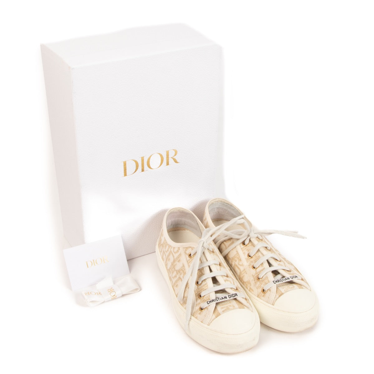 Shop safe online at Labellov in Antwerp, Brussels and Knokke these 100% authentic second hand Christian Dior Gold Monogram Walk'n'Dior Sneakers - size 38,5