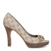 Gucci Canvas Monogram Peep Toe Wooden Heel Pumps - Size 37,5 available online at Labellov