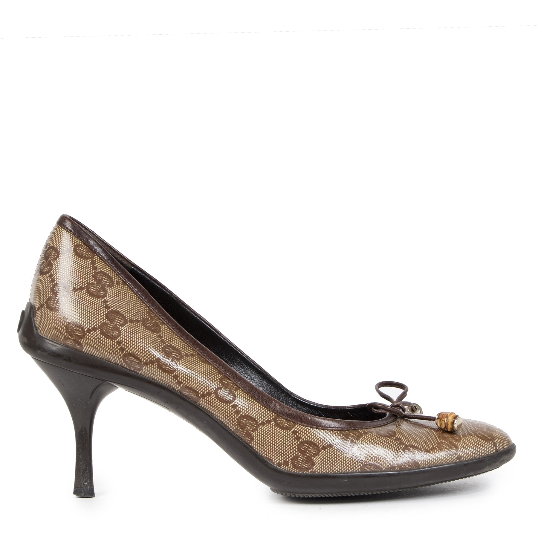 Buy your pair of authentic Gucci Brown GG Canvas Bow Pumps in the size 38