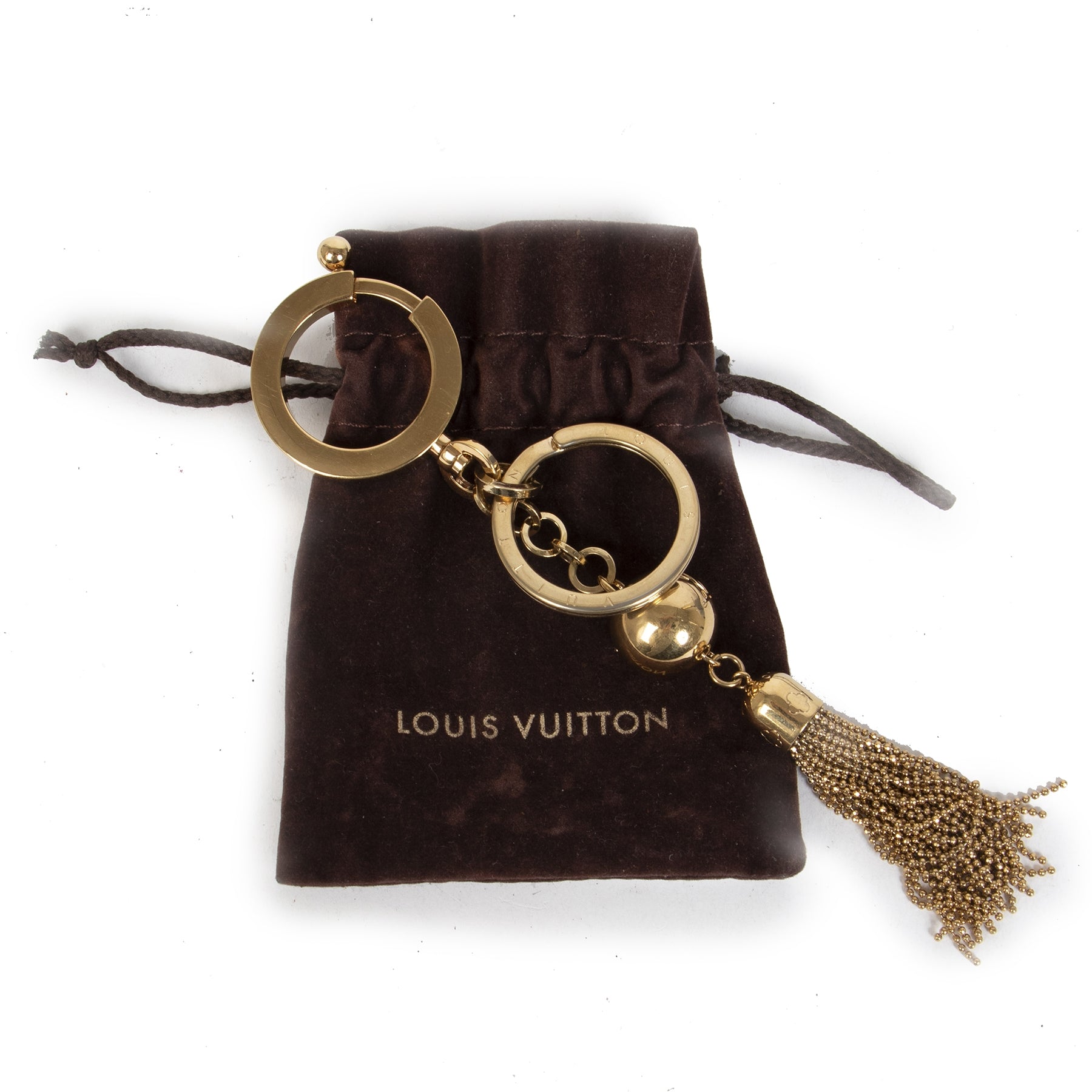 Authentic secondhand Louis Vuitton Gold Swing Tassel Bag Charm & Keychain designer accessories designer brands fashion luxury vintage webshop safe secure online shoppin worldwide shipping