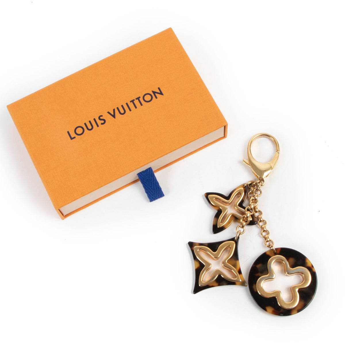 Louis Vuitton Brown Keychain Charm Buy this gorgeous Louis Vuitton piece here safely!
