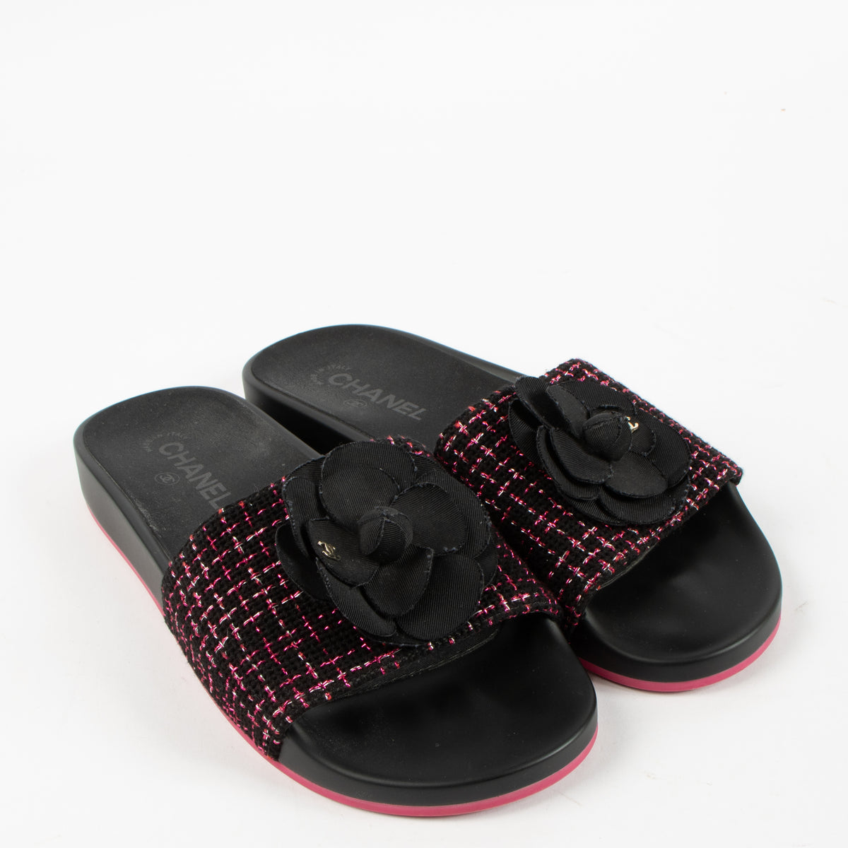 Shop the authentic Chanel 17S Black/Pink Tweed Slides on Labellov.com.