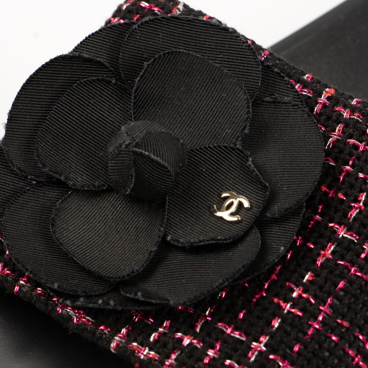 Shop the authentic Chanel 17S Black/Pink Tweed Slides on Labellov.com.