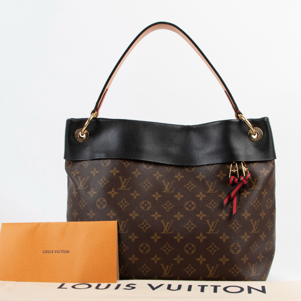 Shop authentic second hand luxury designer Louis Vuitton Tulleries Hobo Monogram Canvas Bag at Labellov