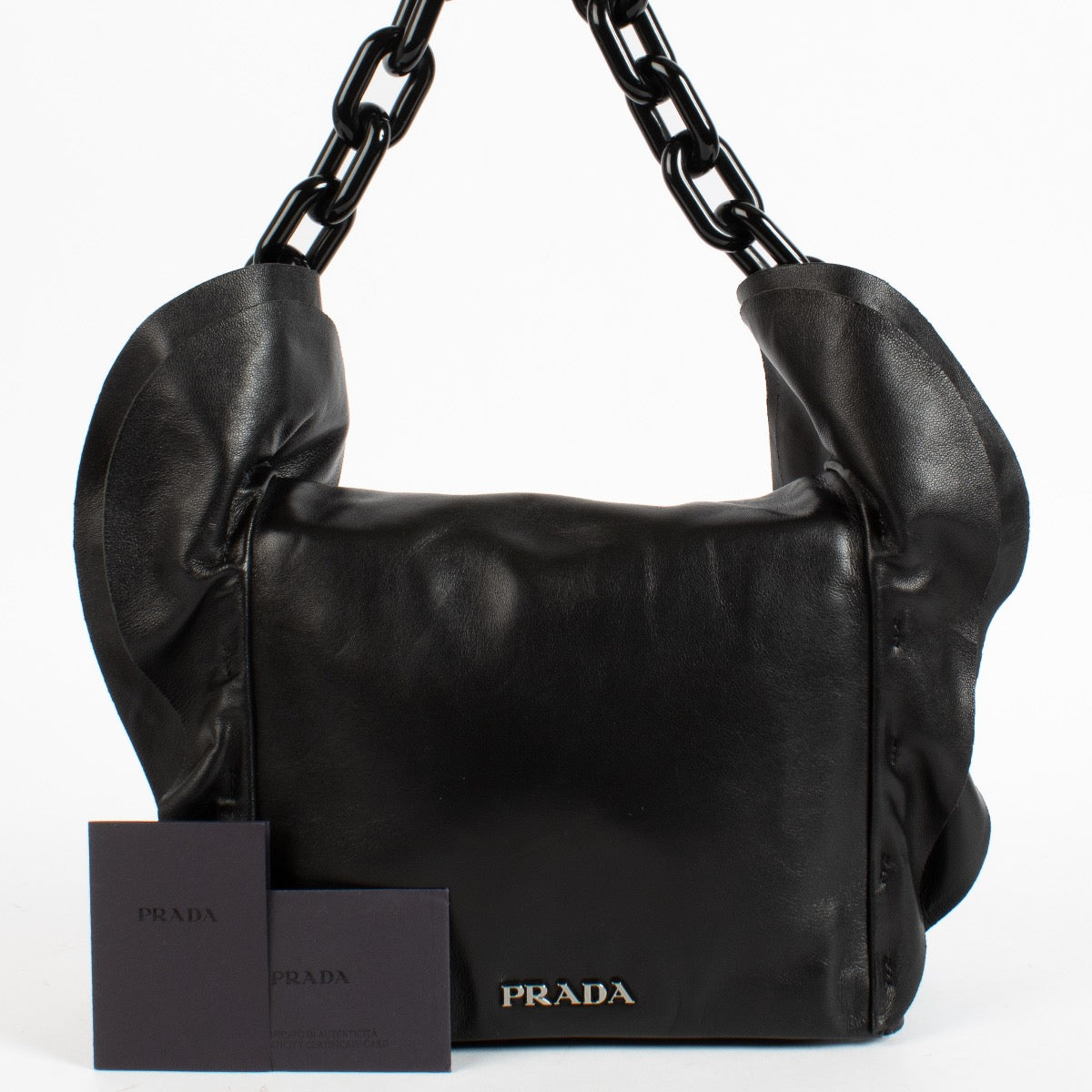 Shop the authentic Prada Black Ruffle Plexi Chain Bag second hand on Labellov.com.