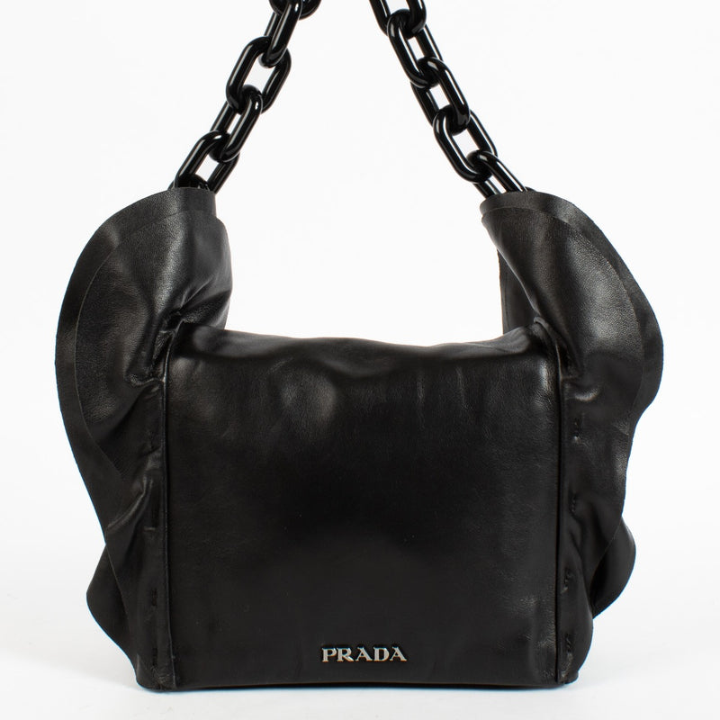 Shop the authentic Prada Black Ruffle Plexi Chain Bag second hand on Labellov.com.