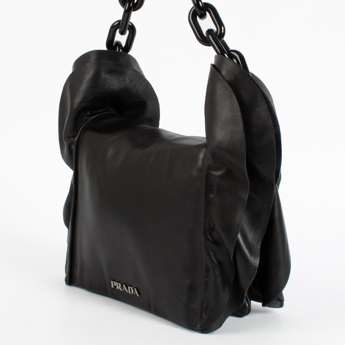 Shop the authentic Prada Black Ruffle Plexi Chain Bag second hand on Labellov.com.