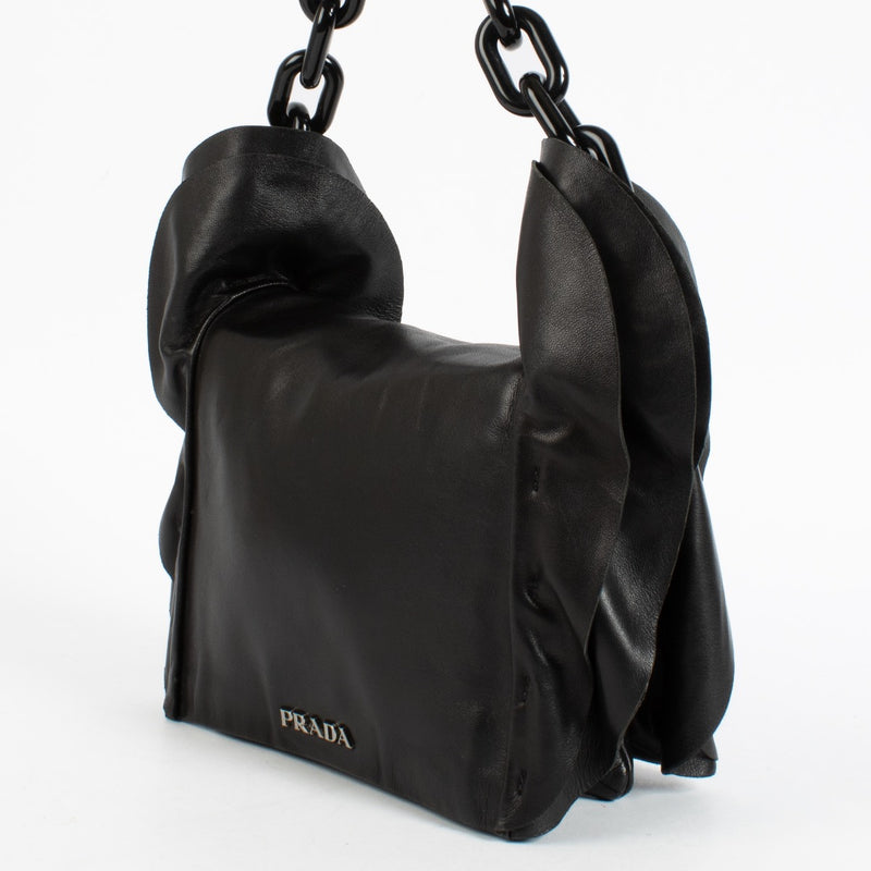 Shop the authentic Prada Black Ruffle Plexi Chain Bag second hand on Labellov.com.