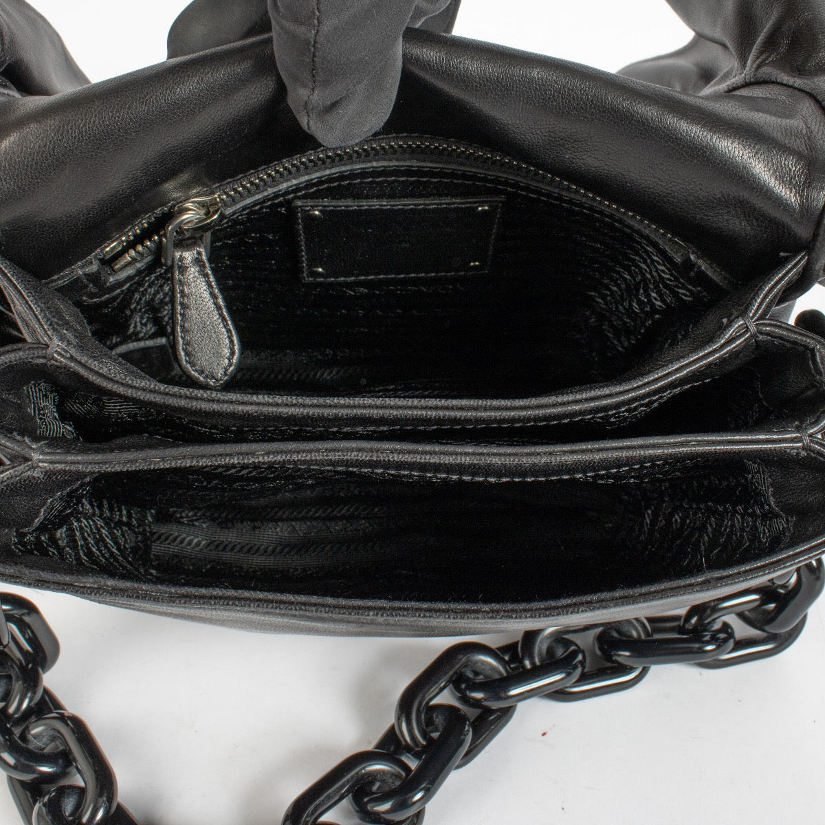 Shop the authentic Prada Black Ruffle Plexi Chain Bag second hand on Labellov.com.