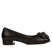 Chanel Black Camelia Ballerina Flats - size 37 for the best price at Labellov secondhand luxury in Antwerp. We buy and sell your preloved and brand new designer bags.