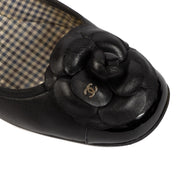 Chanel Black Camelia Ballerina Flats - size 37 for the best price at Labellov secondhand luxury in Antwerp. We buy and sell your preloved and brand new designer bags.