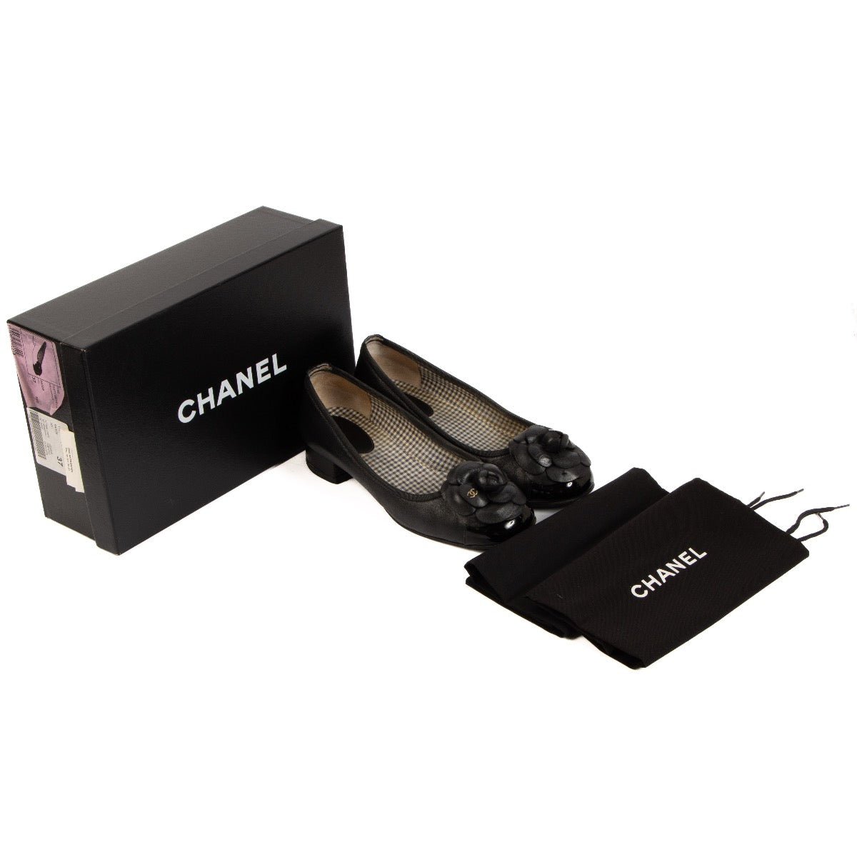 Chanel Black Camelia Ballerina Flats - size 37 for the best price at Labellov secondhand luxury in Antwerp. We buy and sell your preloved and brand new designer bags.