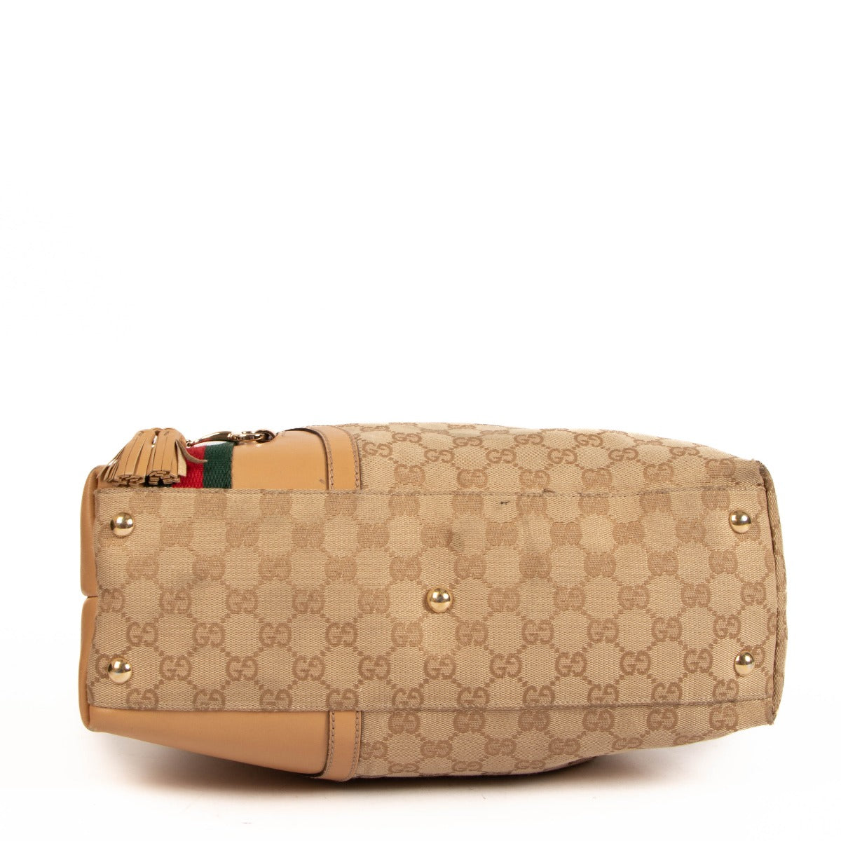 Sac Hobo moyen Gucci en toile GG beige avec mors et pompon