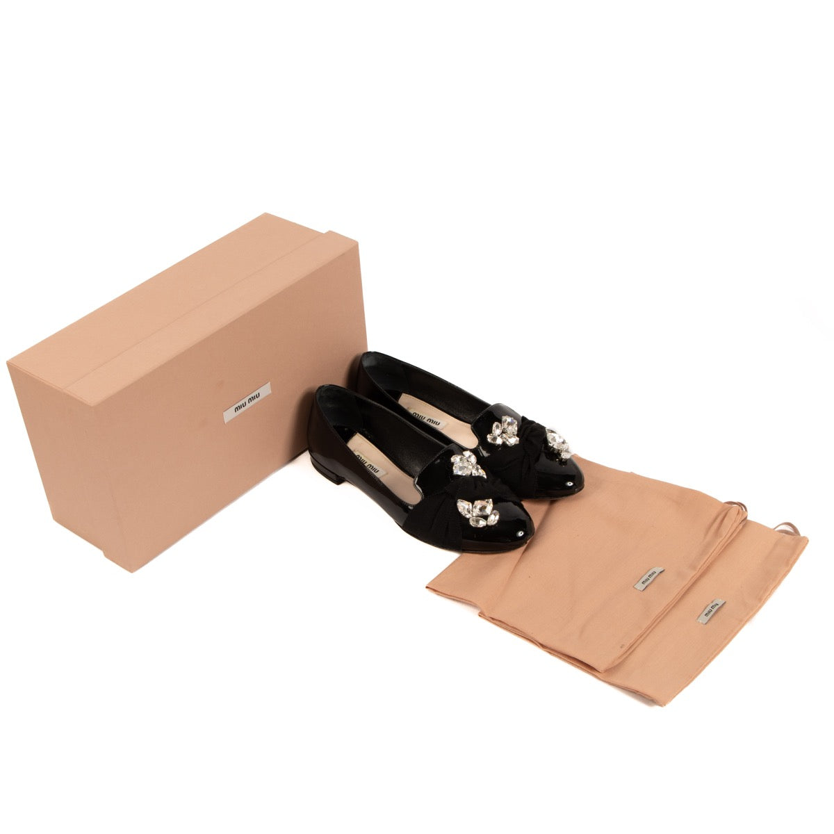 Shop safe online at Labellov these 100% authentic second hand Miu Miu Black Patent Leather Flats - size 36