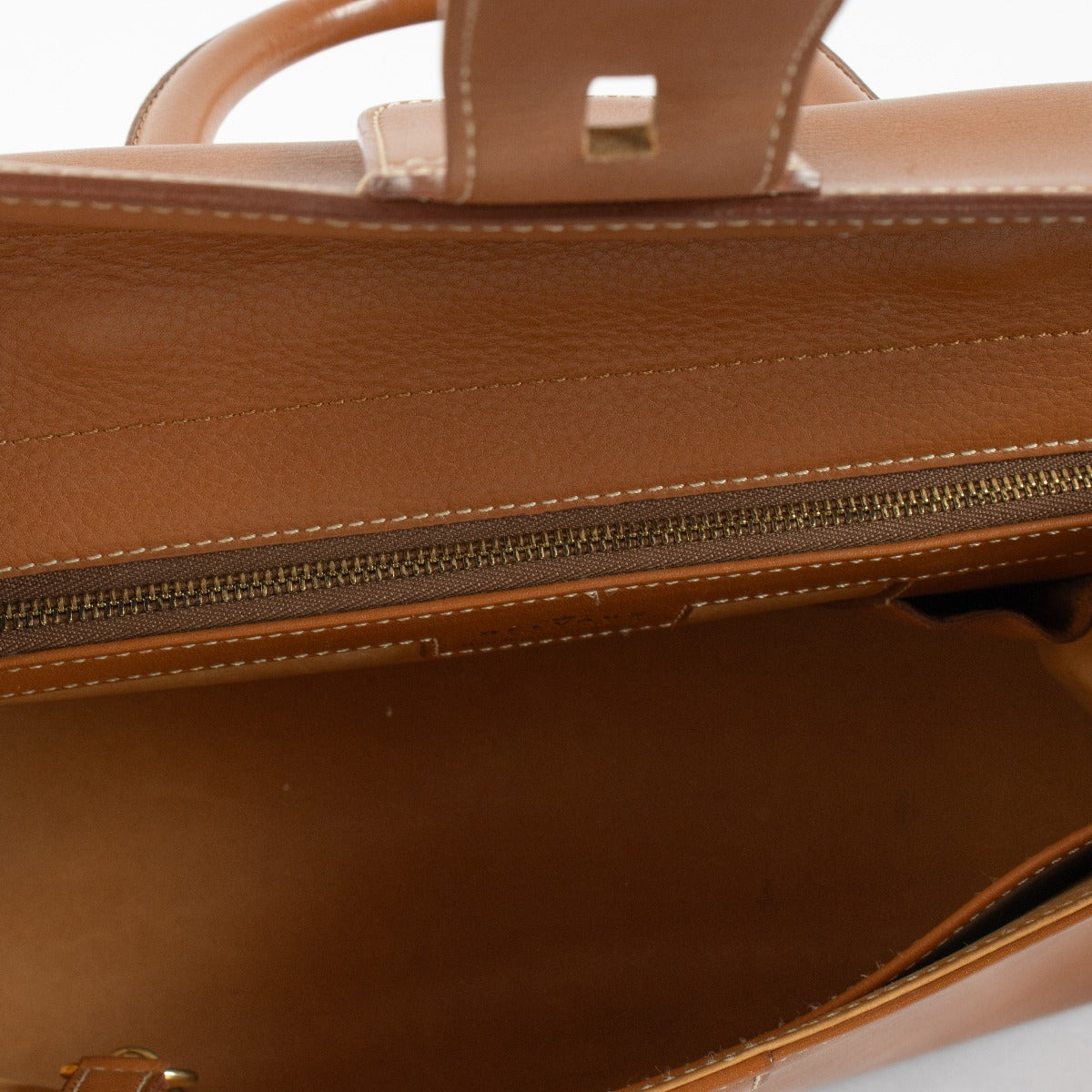 Delvaux Brillant Top Handle Bag in Gold Box Calf leather with gold-tone hardware available at Labellov.com