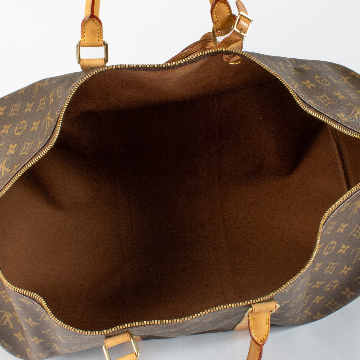 Authentic preloved Louis Vuitton Monogram Keepall 60 on Labellov.com