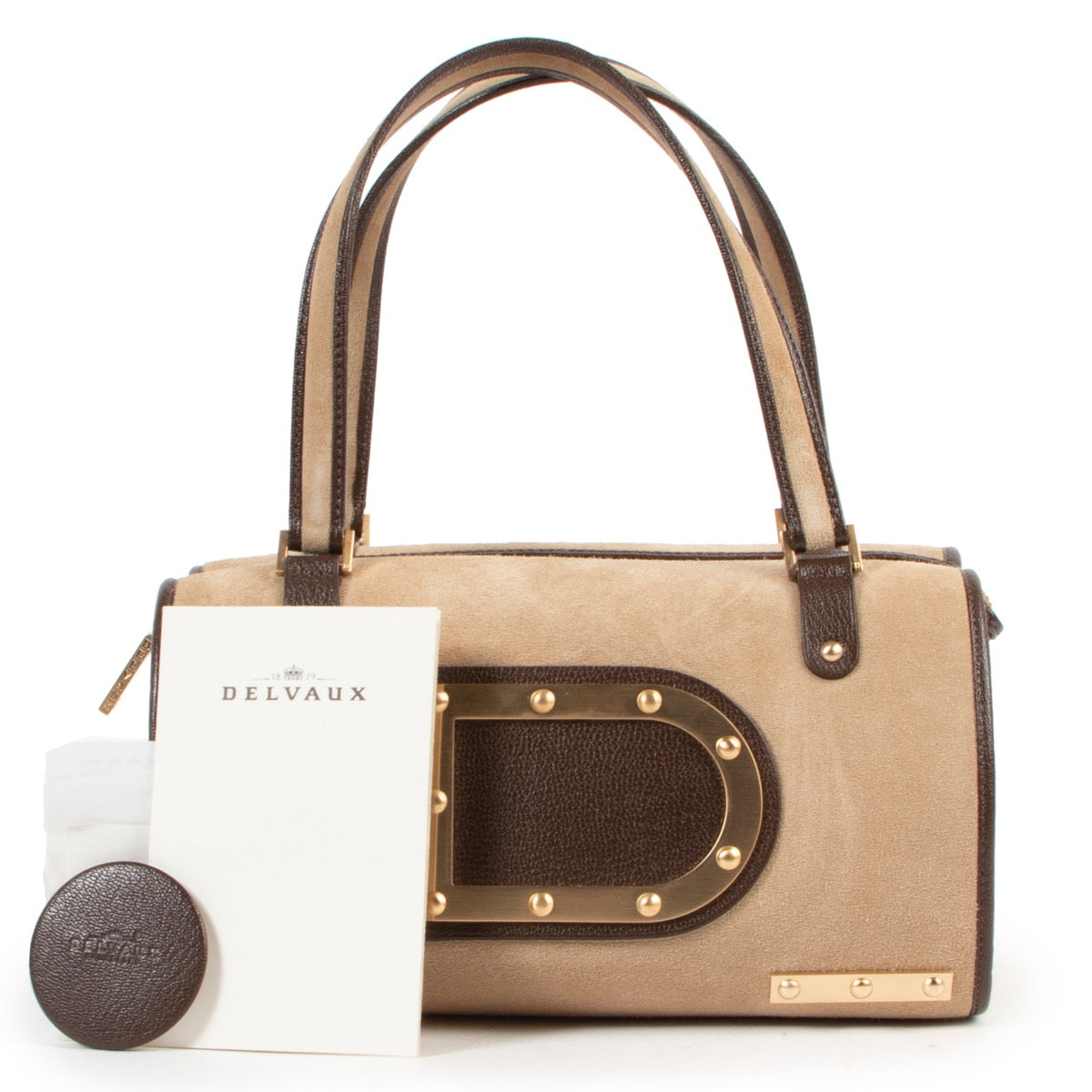 Veilig online kopen van authentieke Delvaux beige Astrid mm handtas aan de juiste prijs.