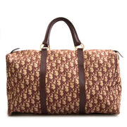 Christian Dior Burgundy Monogram Boston Bag For the best price at LabelLov. Pour le meilleur prix à LabelLOV. Voor de beste prijs bij LabelLOV.