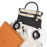 Hermès Kelly 32 Black Togo PHW pour le meilleur prix chez Labellov à Anvers