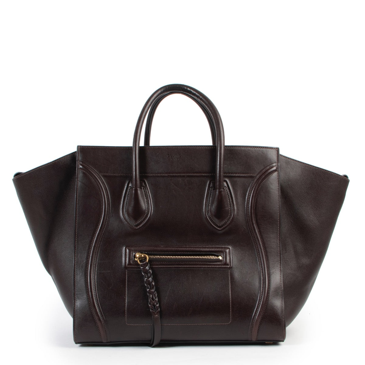Sell or buy your designer items such as this Céline Luggage Phantom Brown Leather Bagle in good preloved condition. Buy or sell Céline items for a fair price online or in store at Labellov