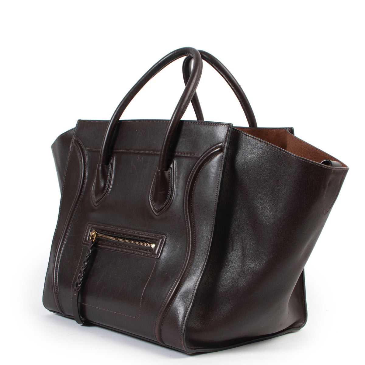 Sell or buy your designer items such as this Céline Luggage Phantom Brown Leather Bagle in good preloved condition. Buy or sell Céline items for a fair price online or in store at Labellov