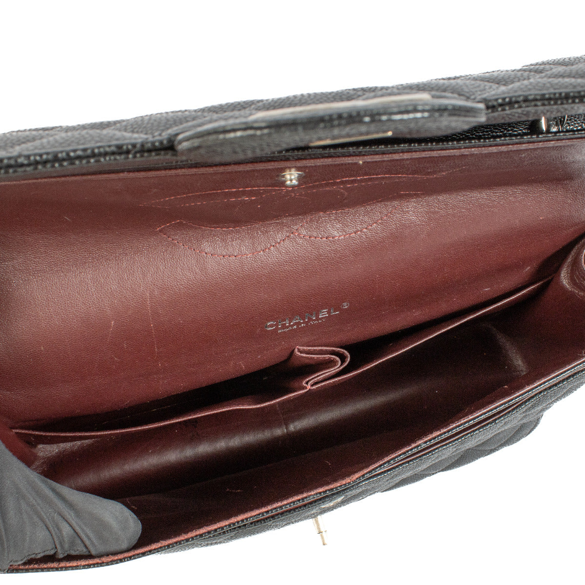 Interior of Chanel Black Caviar Leather Large Classic Flap Bag