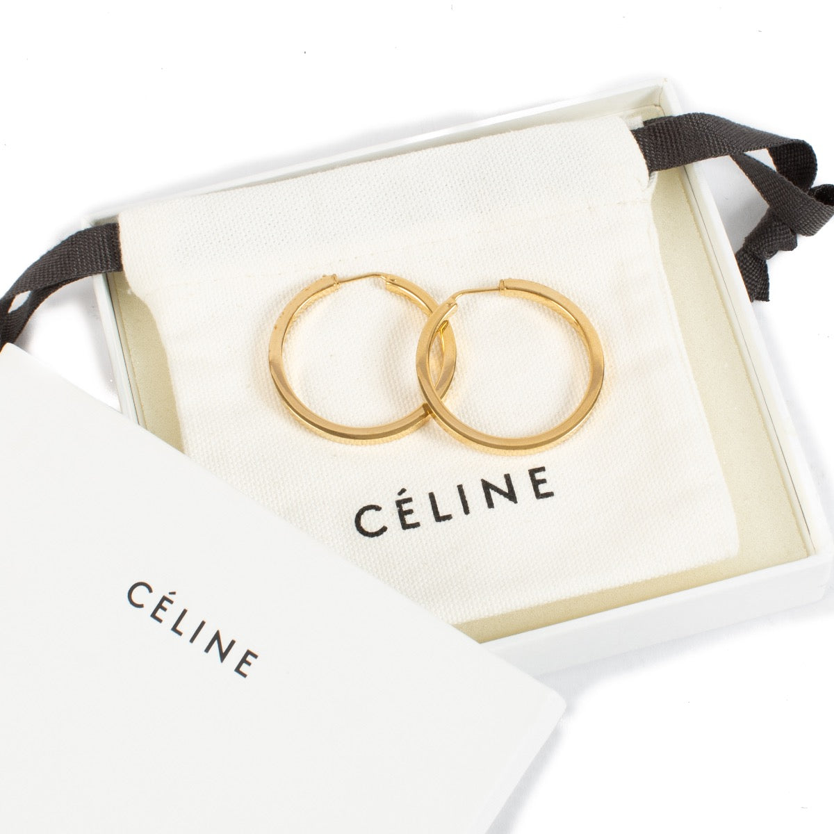 Shop 100% authentic second hand Celine Gold Hoop Earrings on Labellov.com