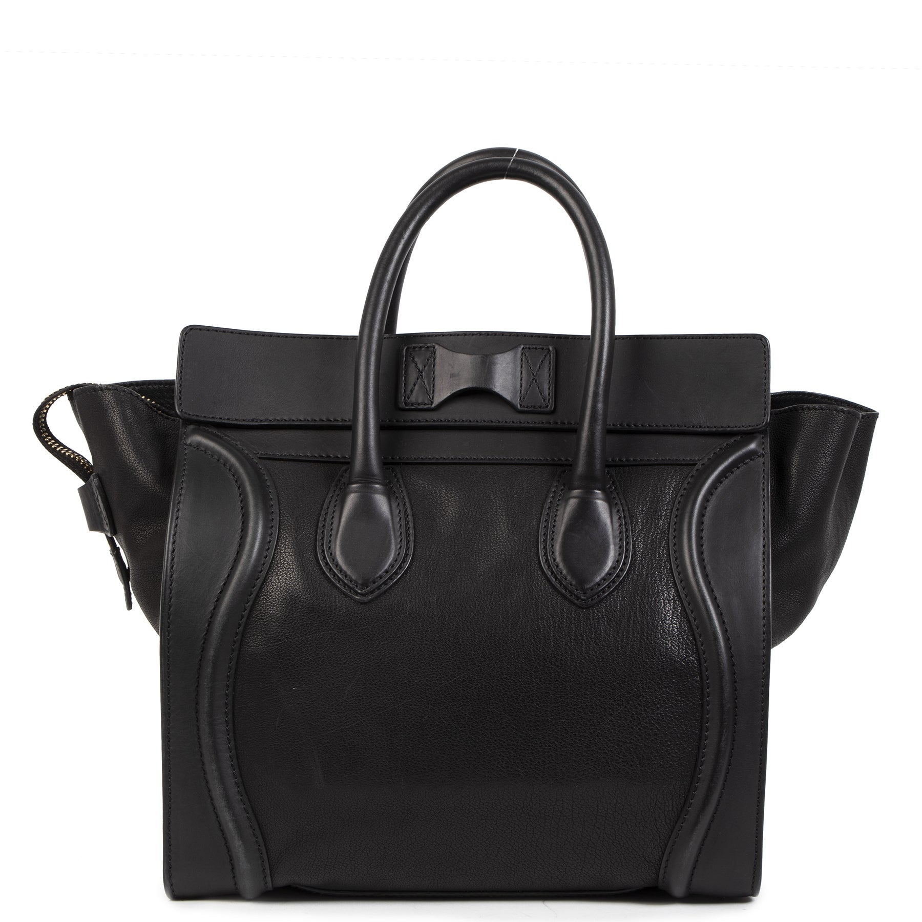 We buy and sell your authentic designer bags online for the best price at Céline Black Calfskin Mini Luggage Handbag