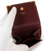 Achetez en ligne second main ce portefeuille Cartier Burgundy chez Labellov.com.