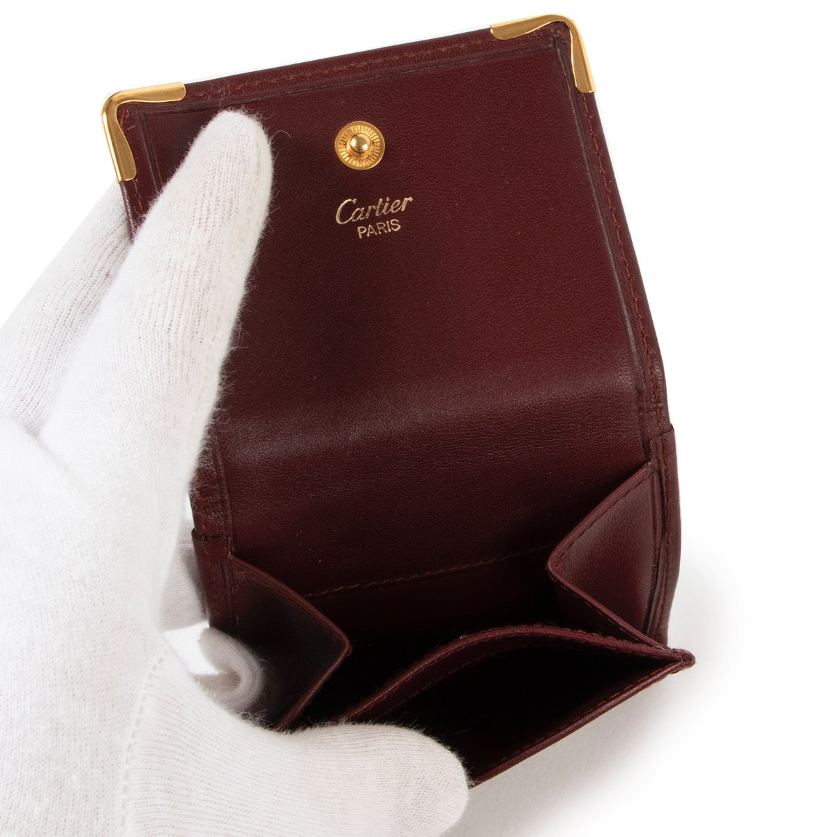 Achetez en ligne second main ce portefeuille Cartier Burgundy chez Labellov.com.