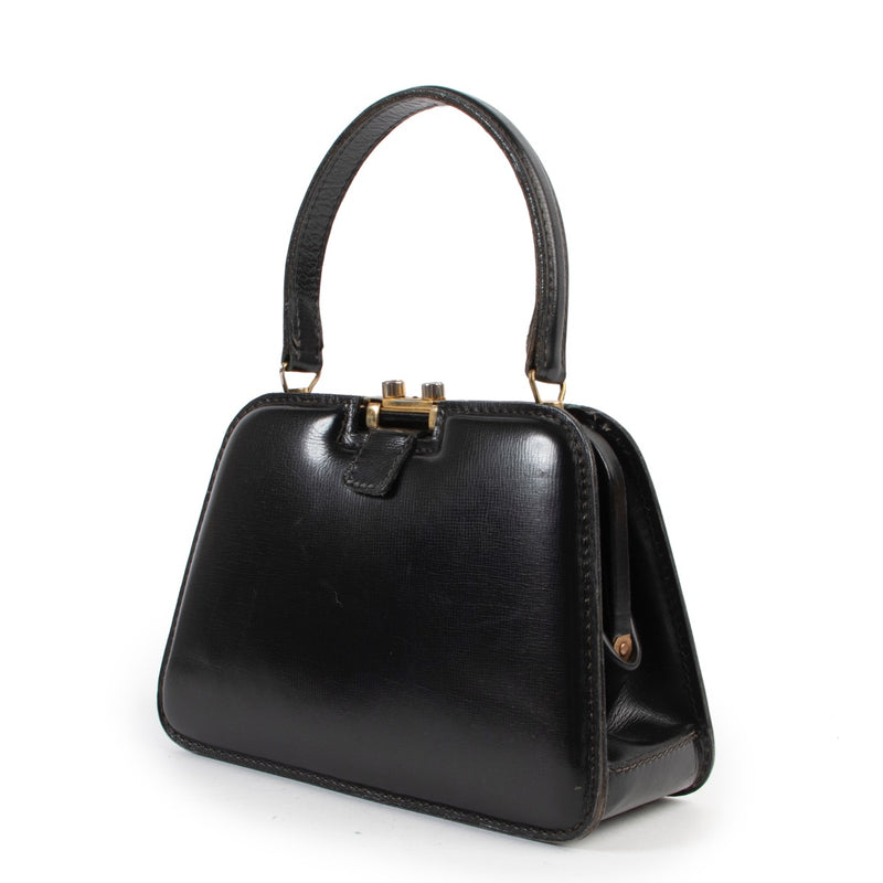 Shop safe online at Labellov in Antwerp this 100% authentic second hand Delvaux Black Top Handle Bag