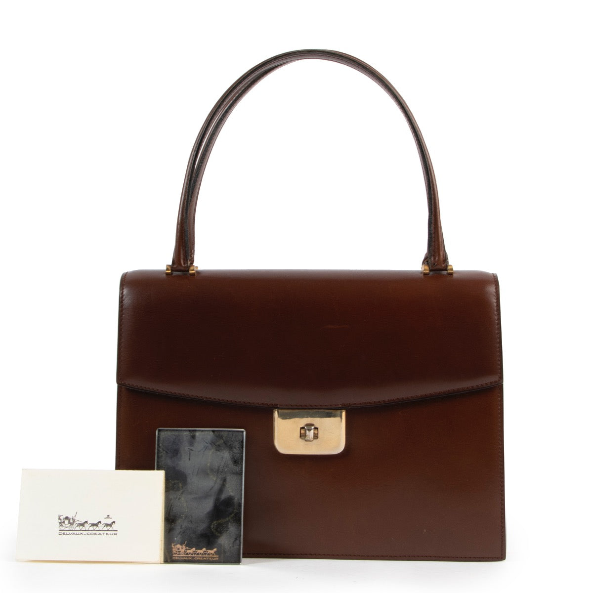 Delvaux Brown Top Handle Bag Buy this piece online safely. 100% authentic