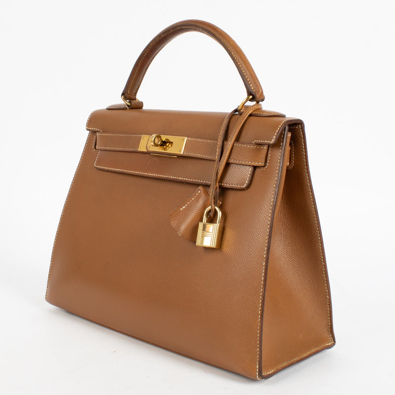 Authentic second hand Hermès Vintage Kelly 28 Gold Courchevel GHW on www.labellov.com