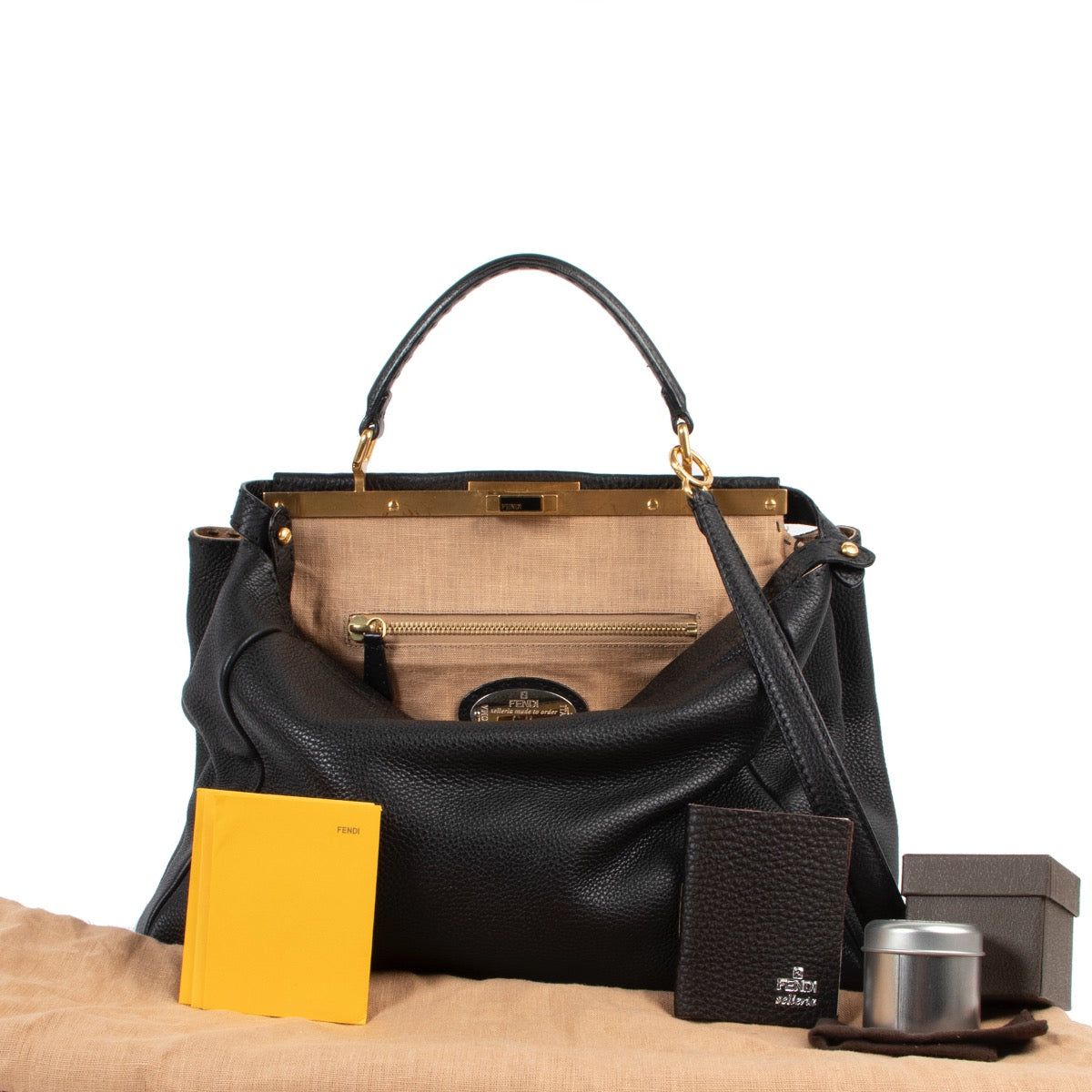 Shop safe online 100% authentic Fendi Black Selleria Leather Large Peekaboo Shoulder Bag in very good condition at the right price at Labellov in Antwerp.