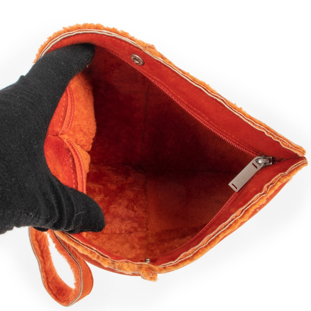Shop safe online at Labellov in Antwerp this 100% authentic second hand Chanel Orange Wool and Suede Clutch