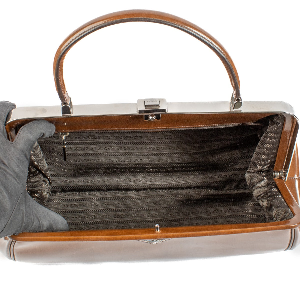 buy 100% authentic pre loved Prada Brown Top Handle Bag on Labellov.com