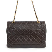 We buy and sell your authentic Chanel Vintage Brown Quilted Flap Bag