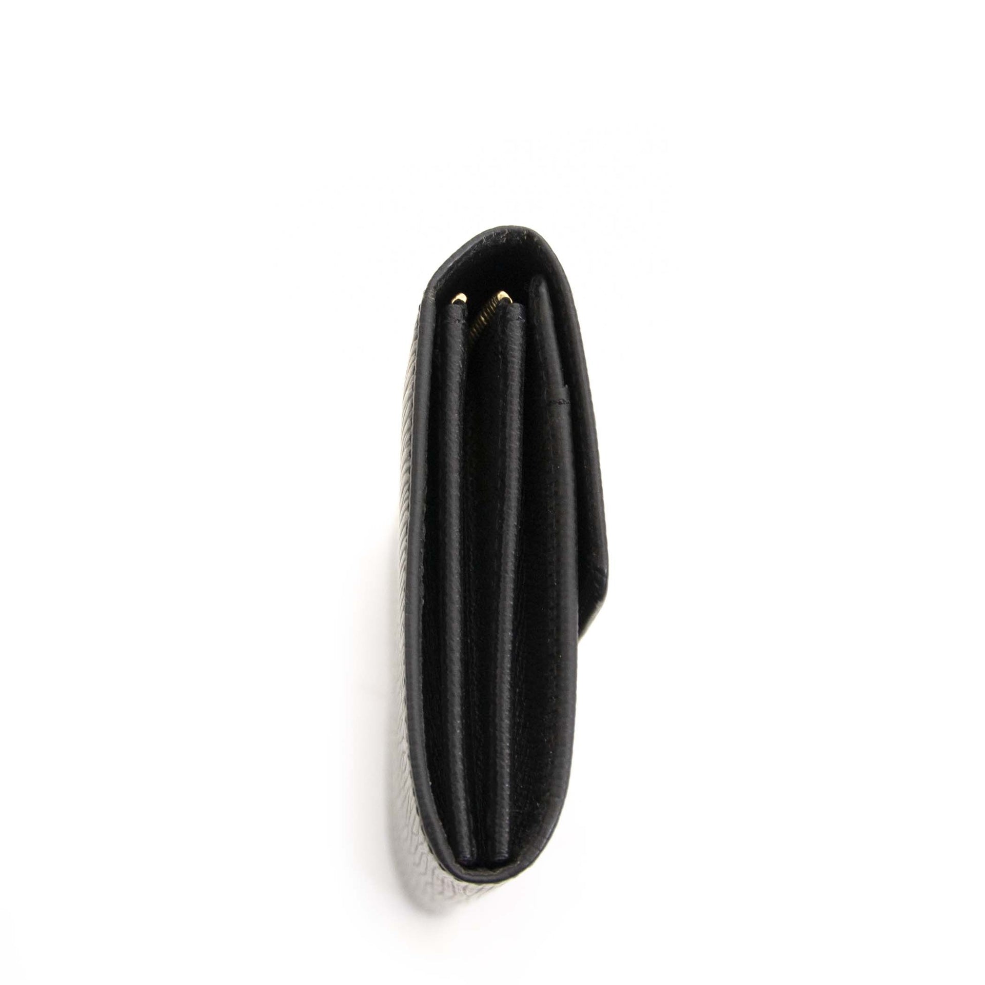Authentic second hand vintage Louis Vuitton Epi Sarah Wallet Black buy online webshop LabelLOV