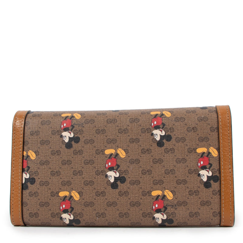 Buy a vintage original Gucci x Disney Mickey Mouse GG Supreme Leather Long Wallet in very good condition at Labellov Antwerp.