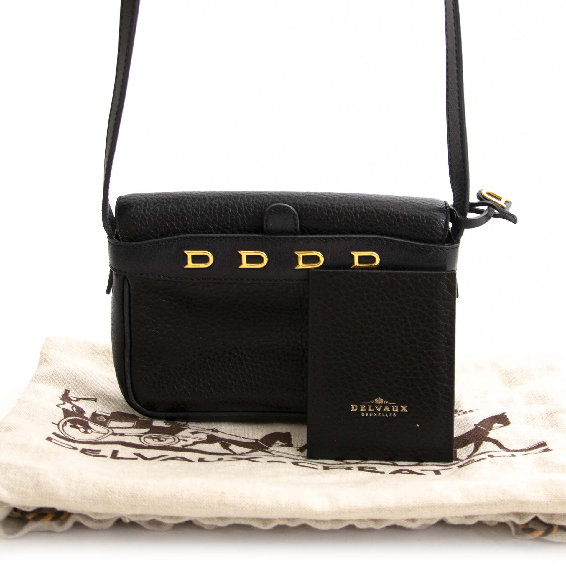 Sac bandoulière mini « D » en cuir noir Delvaux