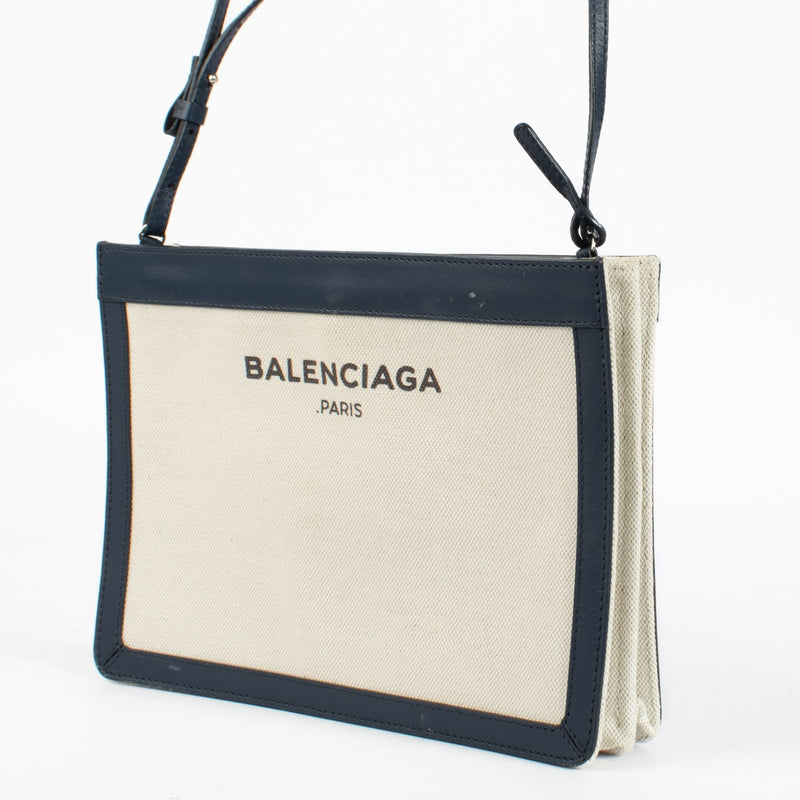 Authentic preloved Balenciaga White Canvas Pochette Bag on Labellov.com