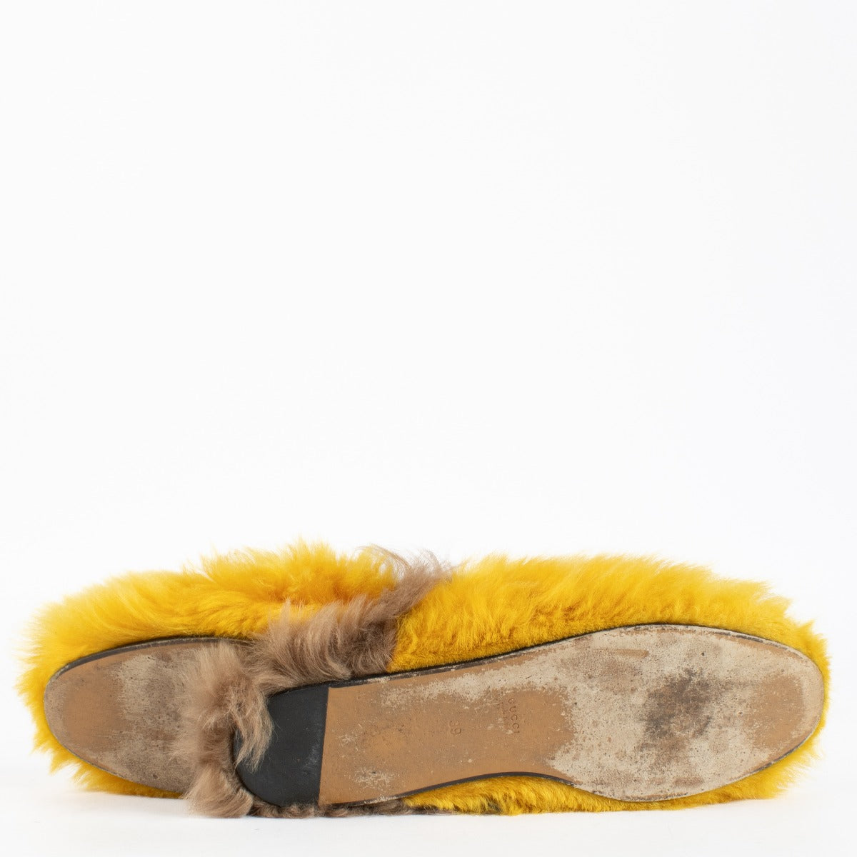 Authentic pre-loved Gucci Yellow Fur Princetown Horsebit Mules — Size 39 on Labellov.com